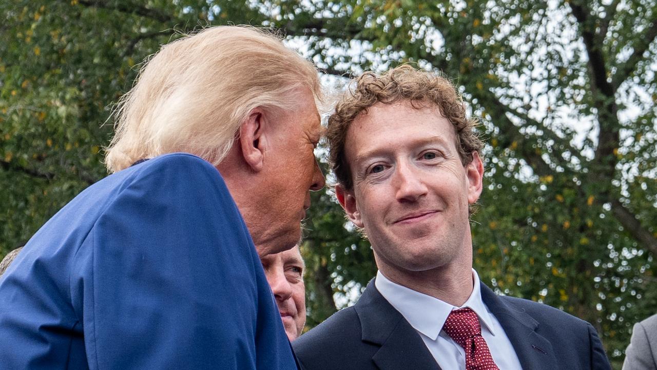 President Donald Trump talks with Meta CEO Mark Zuckerberg