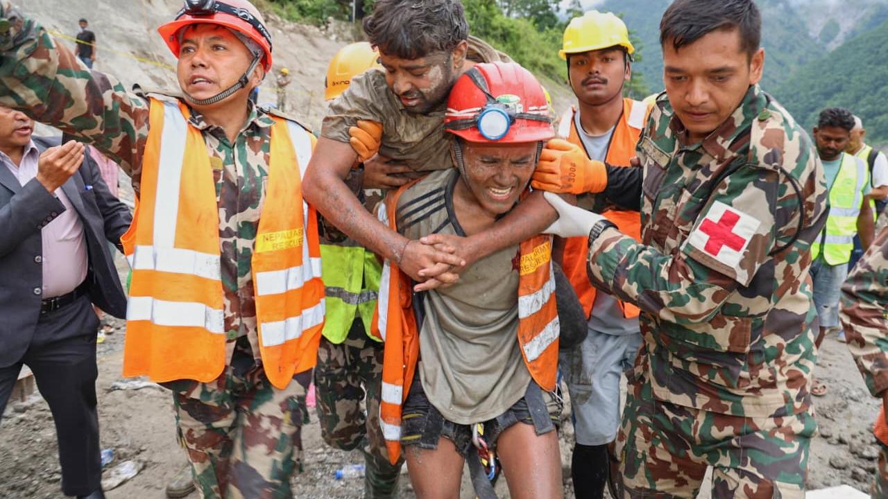 Two men were rescued from a hydropower tunnel