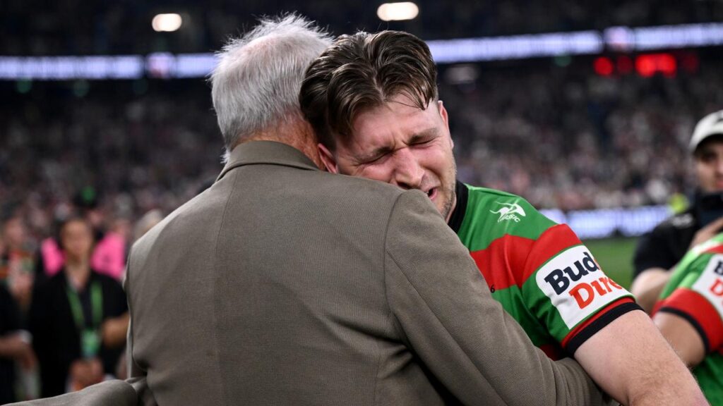 Jai Arrow couldn’t contain his emotions when he was embraced by Rabbitohs coach Wayne Bennett.
