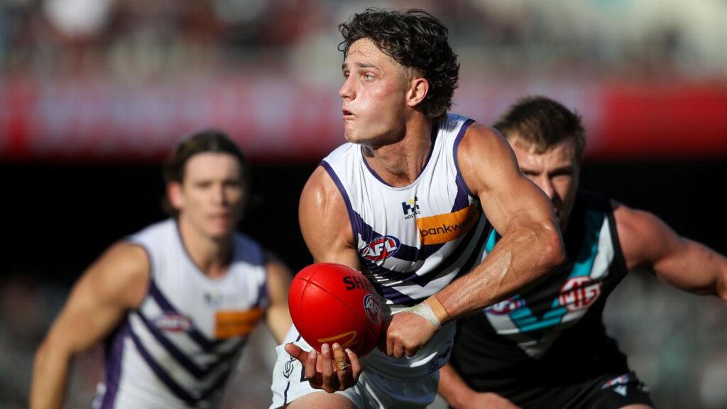 Neil Erasmus says the young Dockers have ‘a job to finish’ in the grand final against Brisbane.
