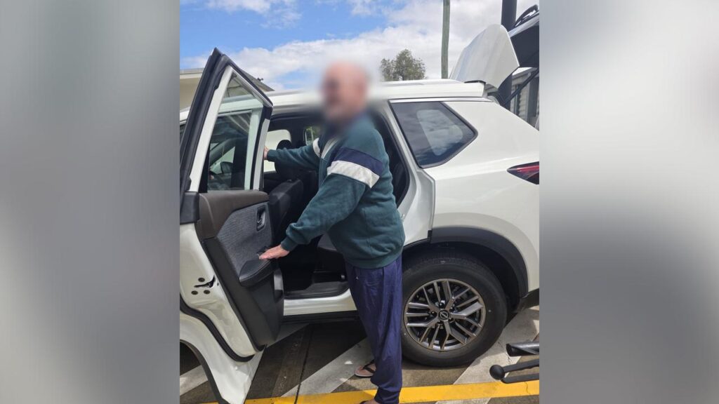 Alexander Robert MacDonald was escorted to a police station south of the Queensland border in March.
