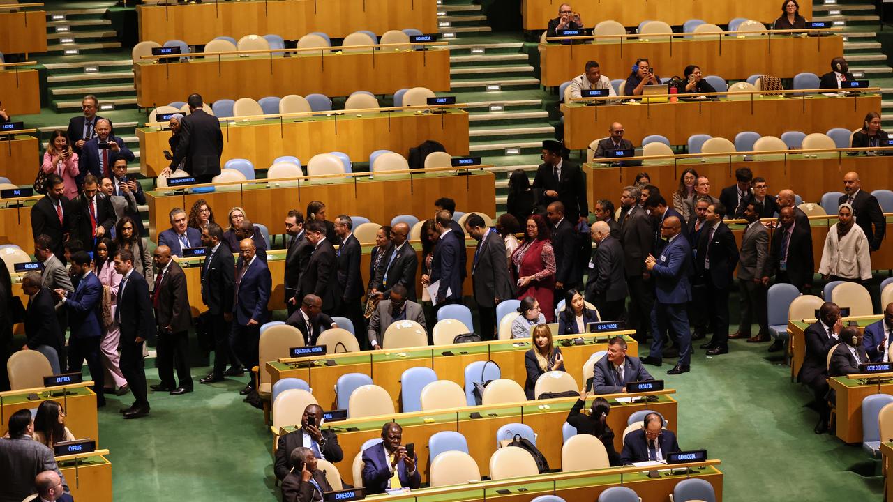 Delegates leave as Israeli Prime Minister Benjamin Netanyahu speaks