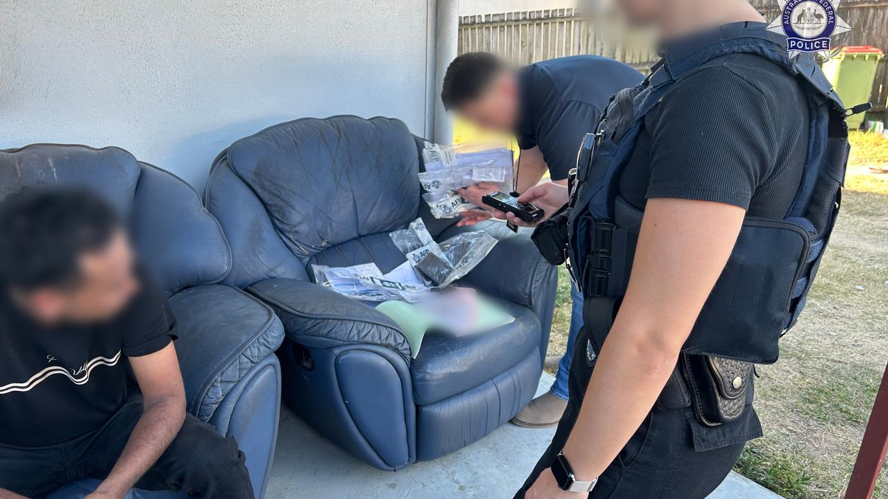 police officers examining documents