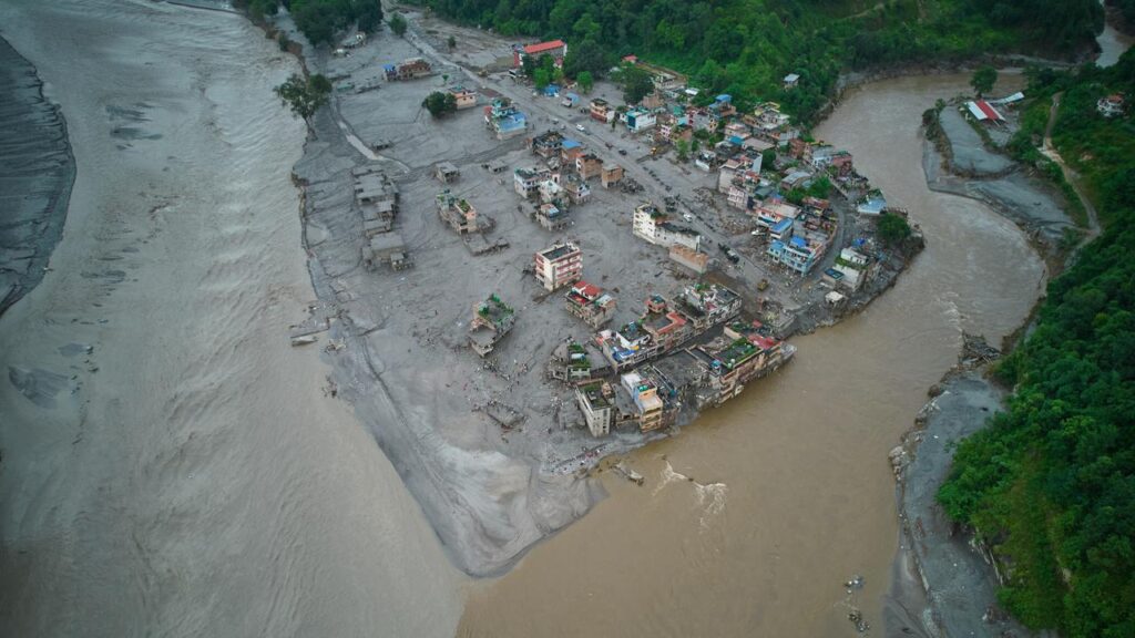 A glacier collapse sent a deluge of ice, rock and mud sweeping through Nepal’s border with China.
