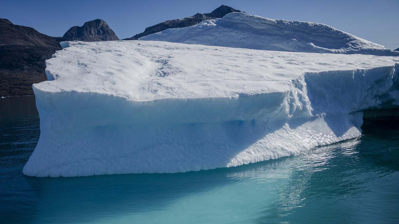 An iceberg floats near Qoornoq, Greenland