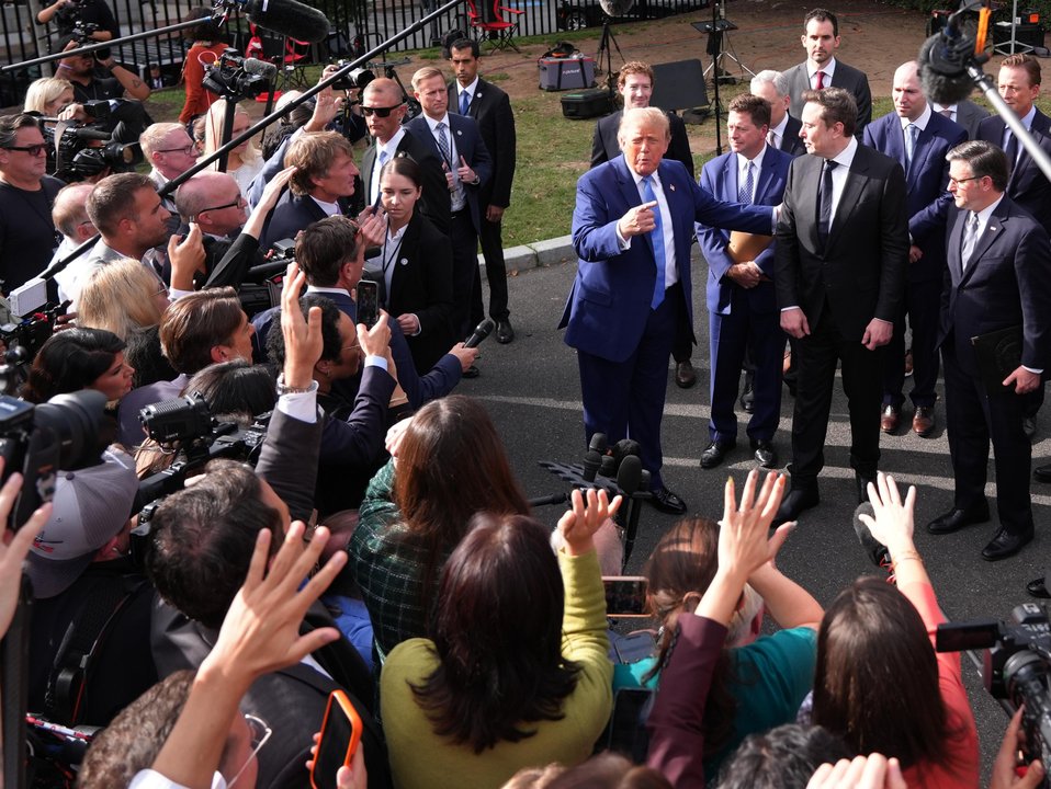 Donald Trump speaks to reporters at the White House