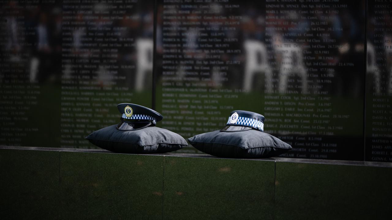 Hats of fallen officers at the NSW Police Wall of Remembrance