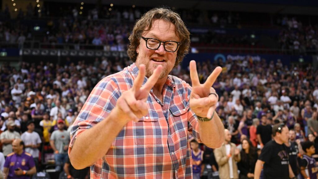 Luc Longley plans to join celebrations in Fremantle if the Dockers win the grand final.
