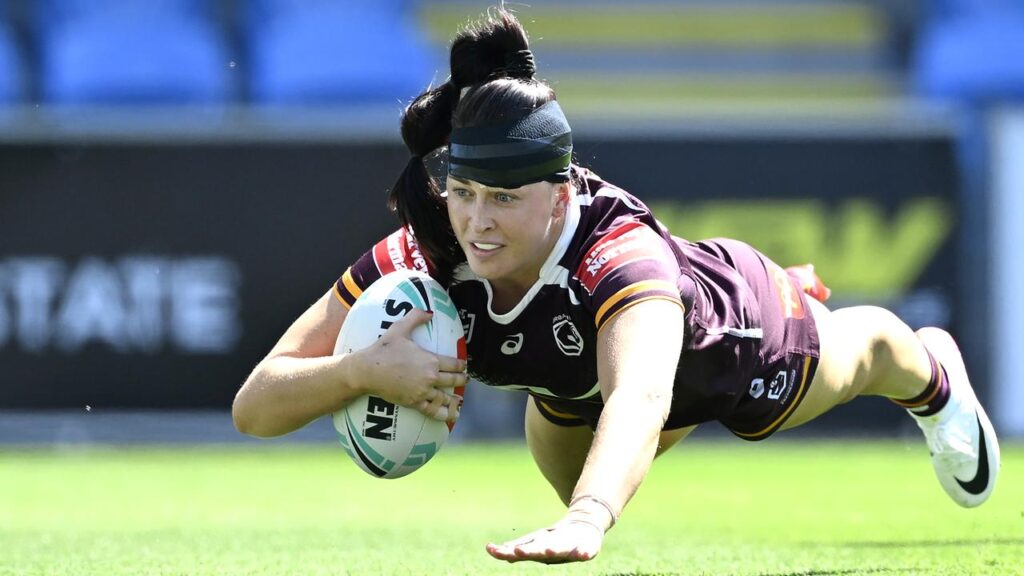 A flying Romy Teitzel touches down for a Broncos try in their Preliminary Final win over the Titans.
