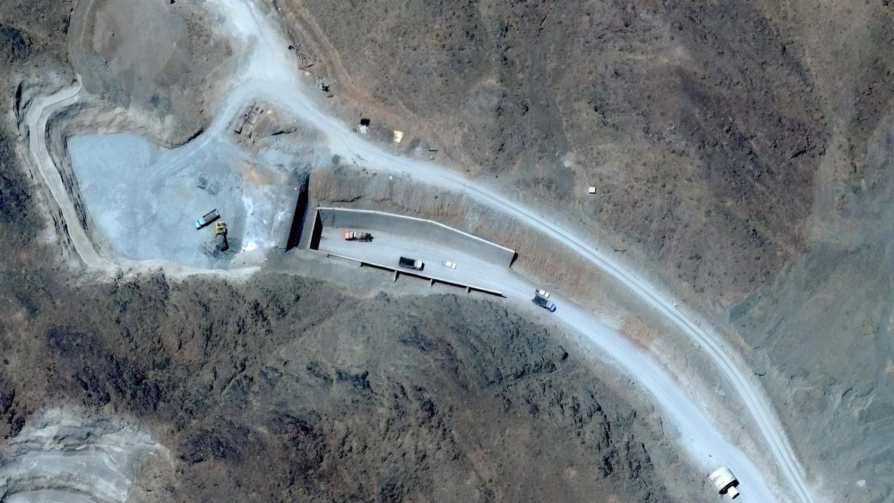 A satellite image vehicles at a tunnel entrance at Pickaxe Mountain