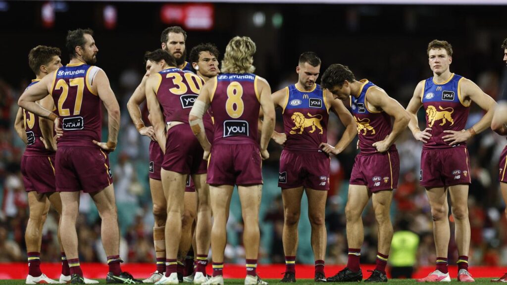 Dejected Lions players after their defeat to Sydney.
