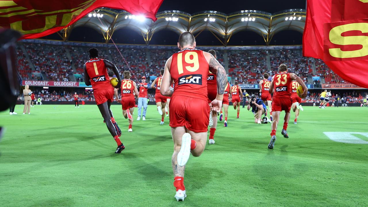 Gold Coast players run out.