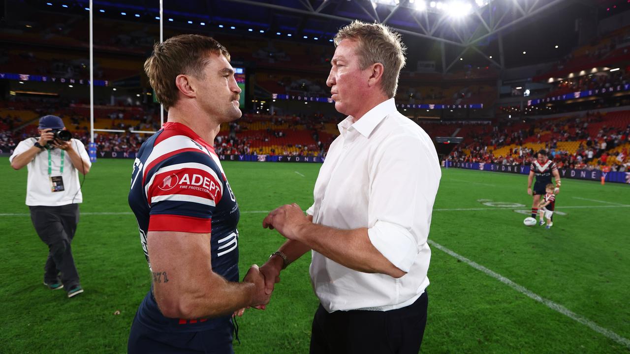 Roosters coach Trent Robinson chats with Connor Watson.