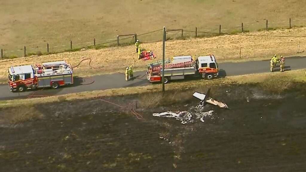 Emergency services are at the scene of a light aircraft crash south of Brisbane.
