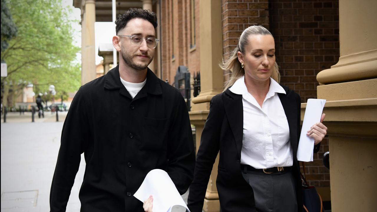 man and woman leave court