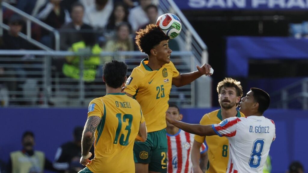 Lucas Herrington (centre) was a breakout star as Australia reached the last 32 at the World Cup.
