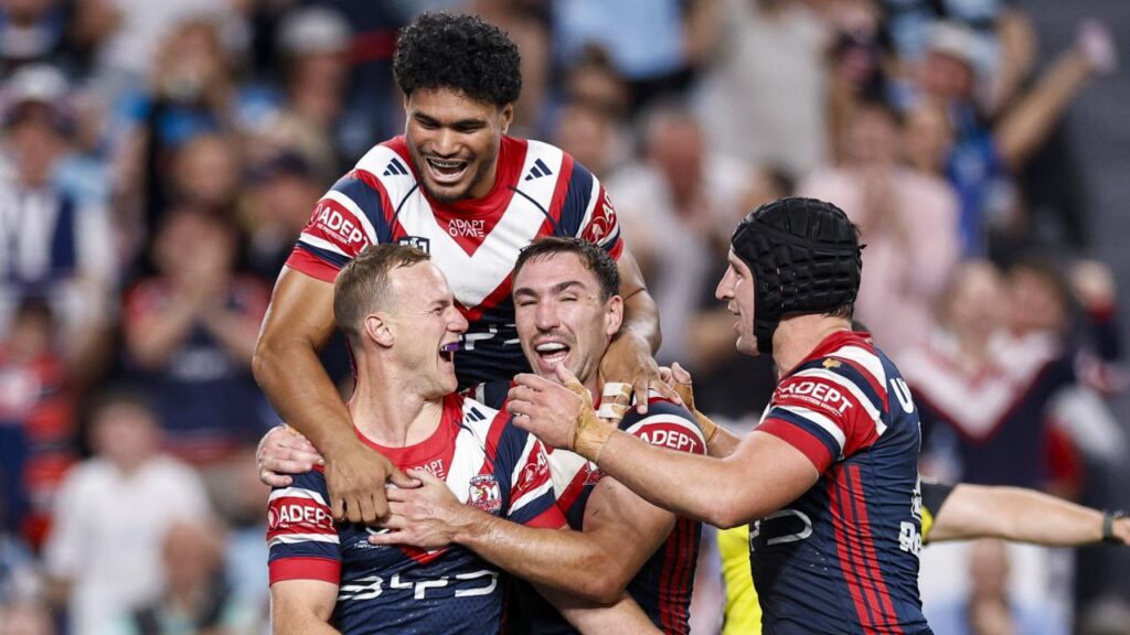 The Sydney Roosters will play the Dolphins for a place in the grand final after beating Cronulla.
