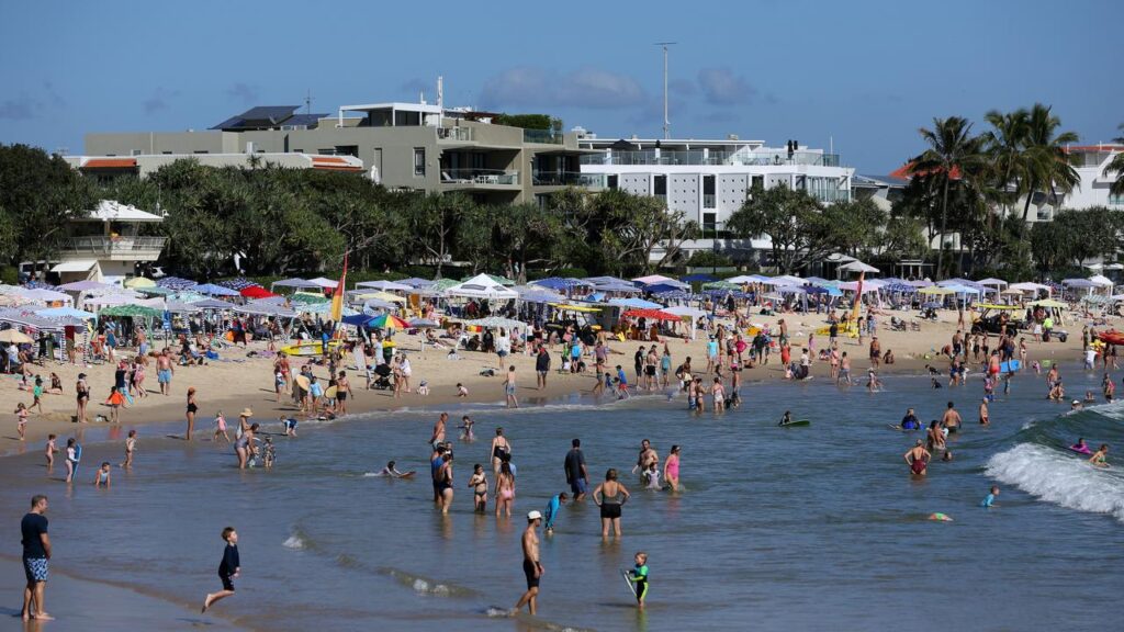Beachgoers sought solace from the heat as temperatures in one state threatened to break records. 
