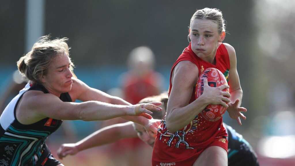 Gold Coast have recorded a gritty win in tough conditions on the road against Port Adelaide.
