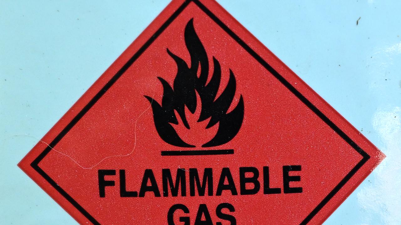 A warning sign on a barbecue LPG gas bottle