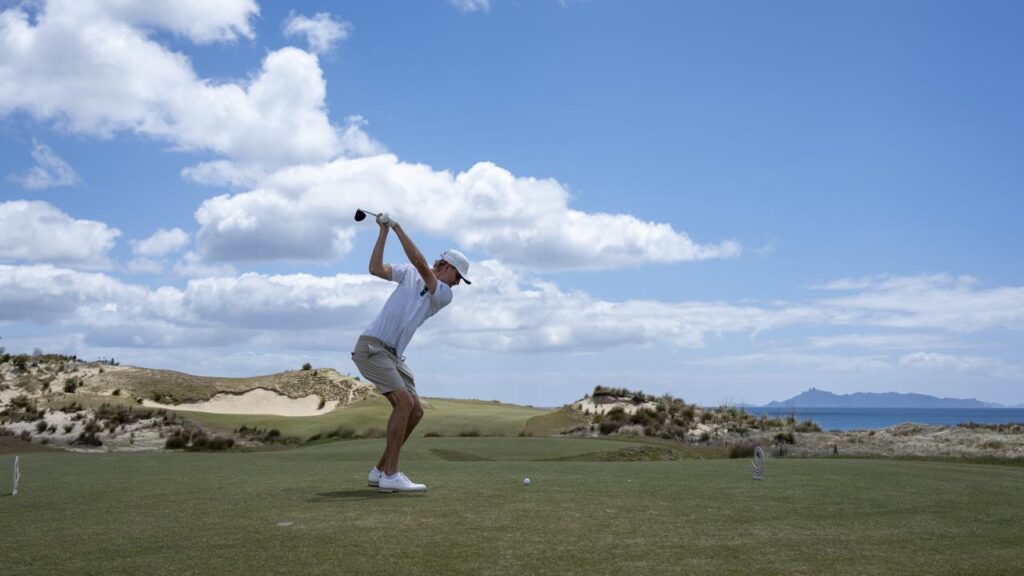 Harry Takis drives while making third-round ground at the Asia-Pacific Amateur Championship.
