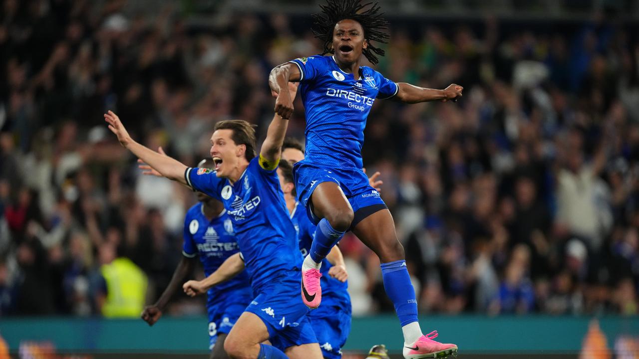 James Lackay (r) celebrates cup final win.