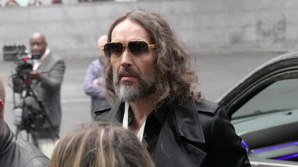 A woman accuses Russell Brand of sexually assaulting her in the mid-2000s at a London radio studio.

