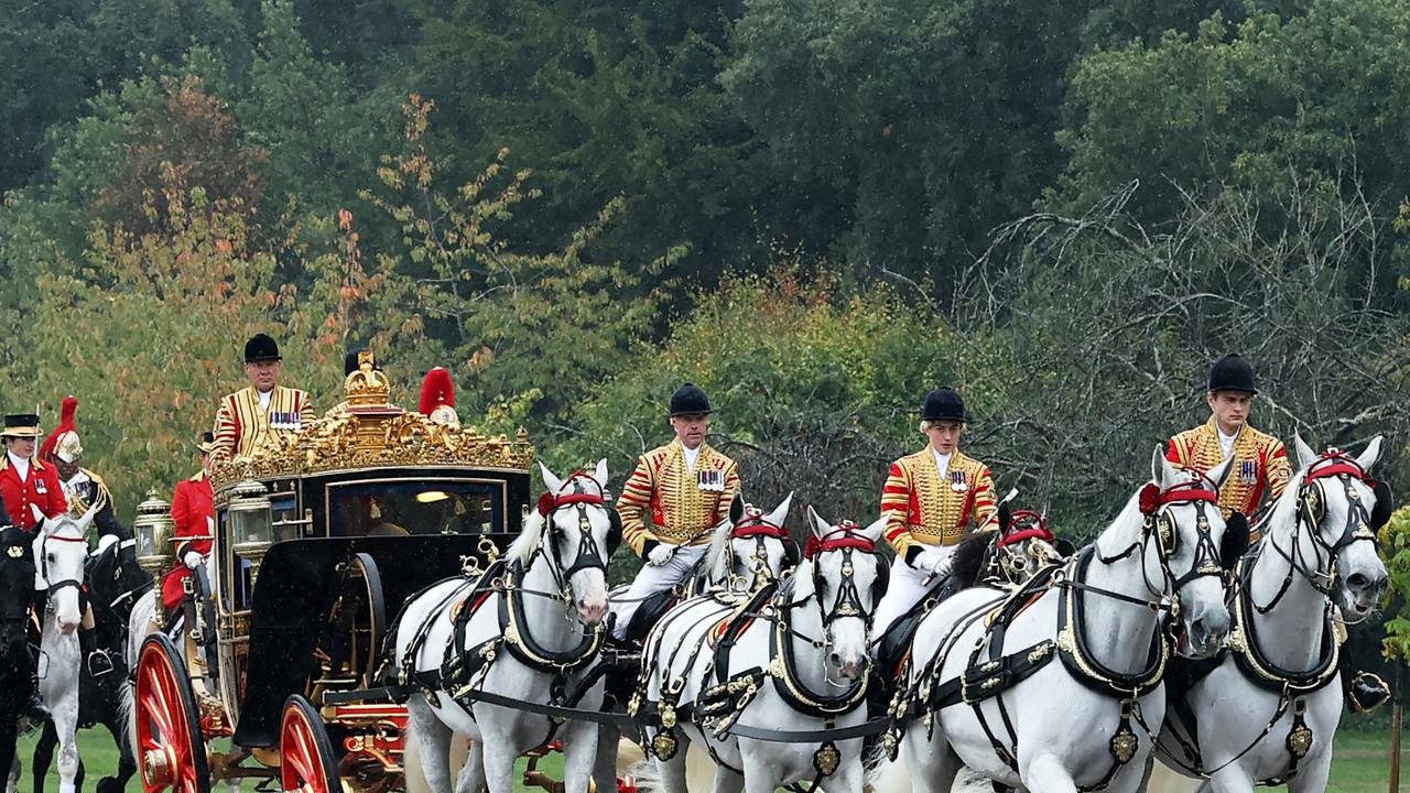 A coach lead the procession to a ceremonial welcome at Windsor Castle