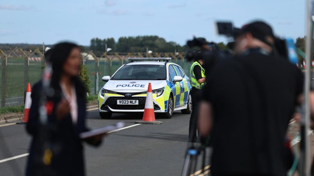 A UK-Iranian man has become the sixth person to be arrested over a suspected air base attack plot.
