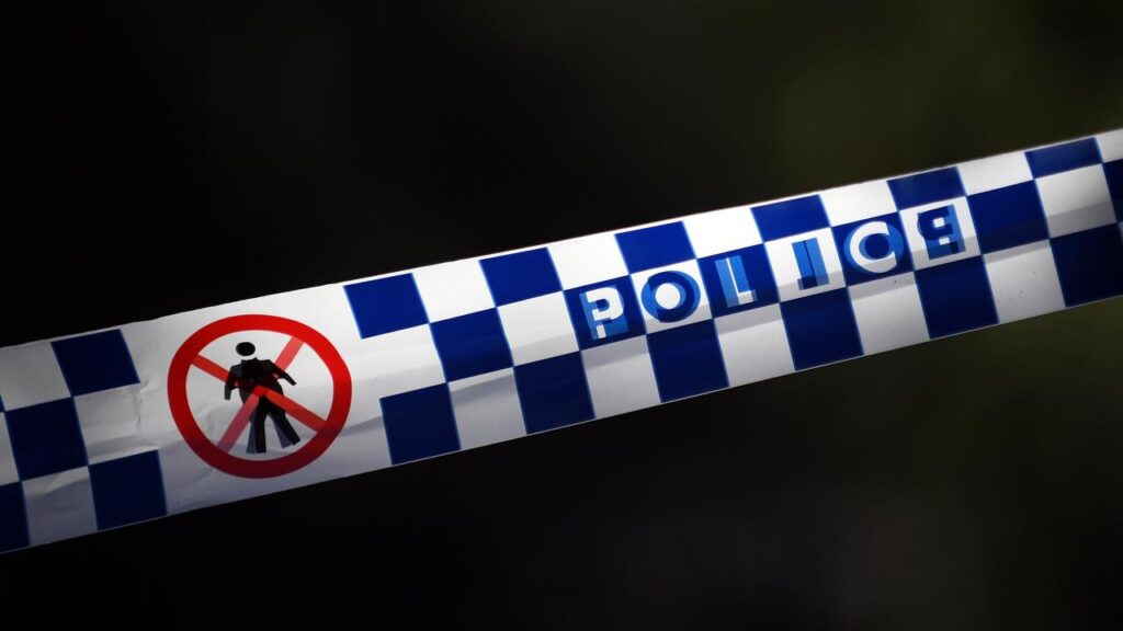 Police are working to identify the body of a person found in a trough at a rural stockyard.
