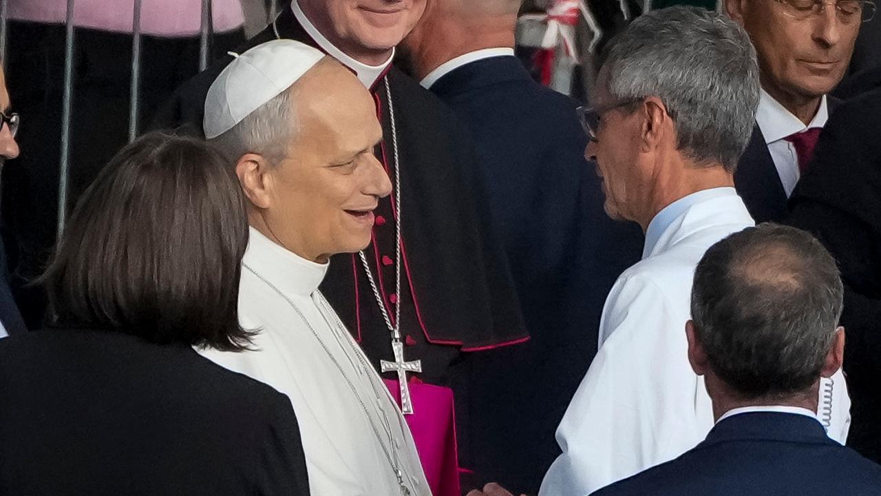 Pope Leo XIV is seen off by surgeon Stefano Margaritora