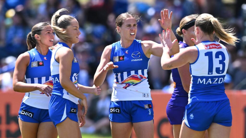 Jasmine Garner (c) was inspirational as North Melbourne held off Fremantle’s challenge.
