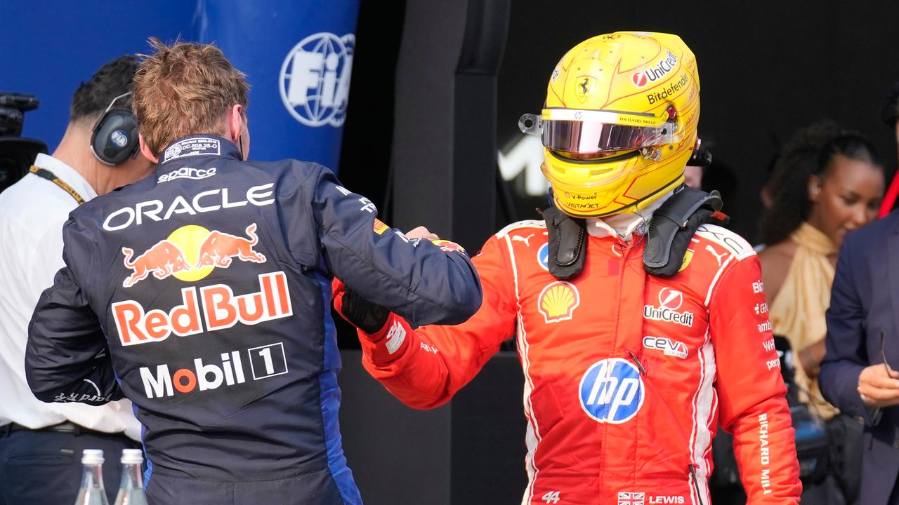 (L-R) Max Verstappen and Lewis Hamilton.