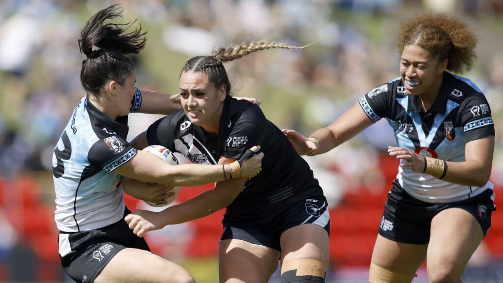 Talei Holmes tackling New Zealand’s Alexis Tauaneai as Fiji put up a fine World Cup show.
