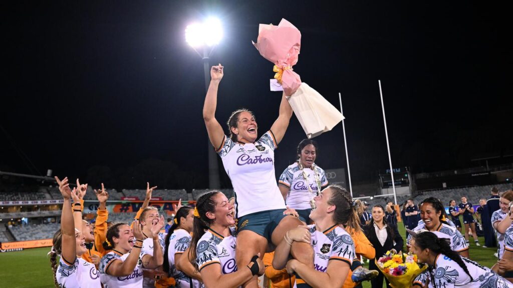 Emily Chancellor and Cecilia Smith were chaired off after their Wallaroos farewell victory.
