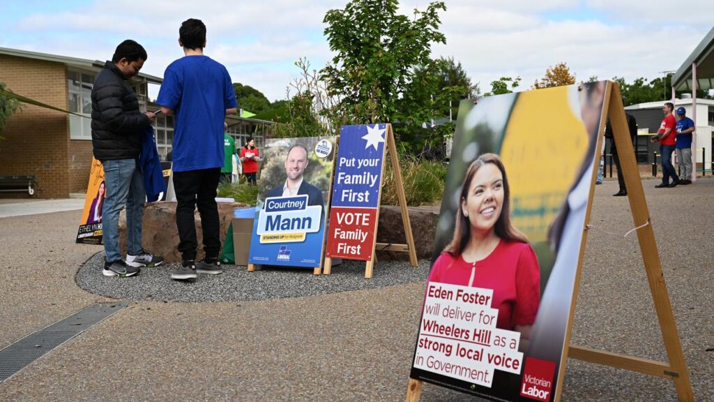 The husband of a candidate was allegedly assaulted by a man attempting to remove a campaign sign.
