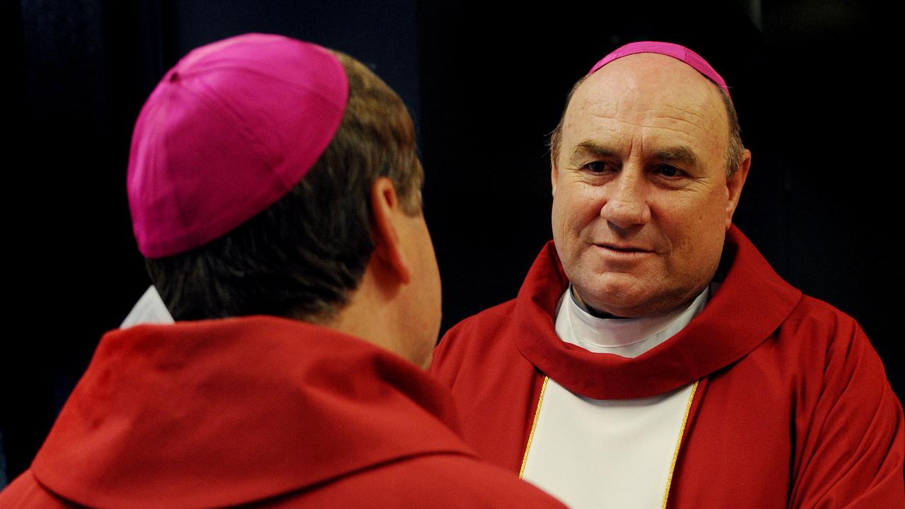 Bishop saunders in red robes