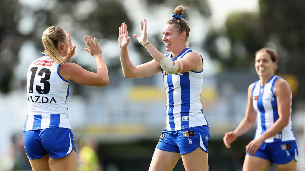 Tahlia Randall has helped North Melbourne thrash Richmond to secure the AFLW’s minor premiership. 
