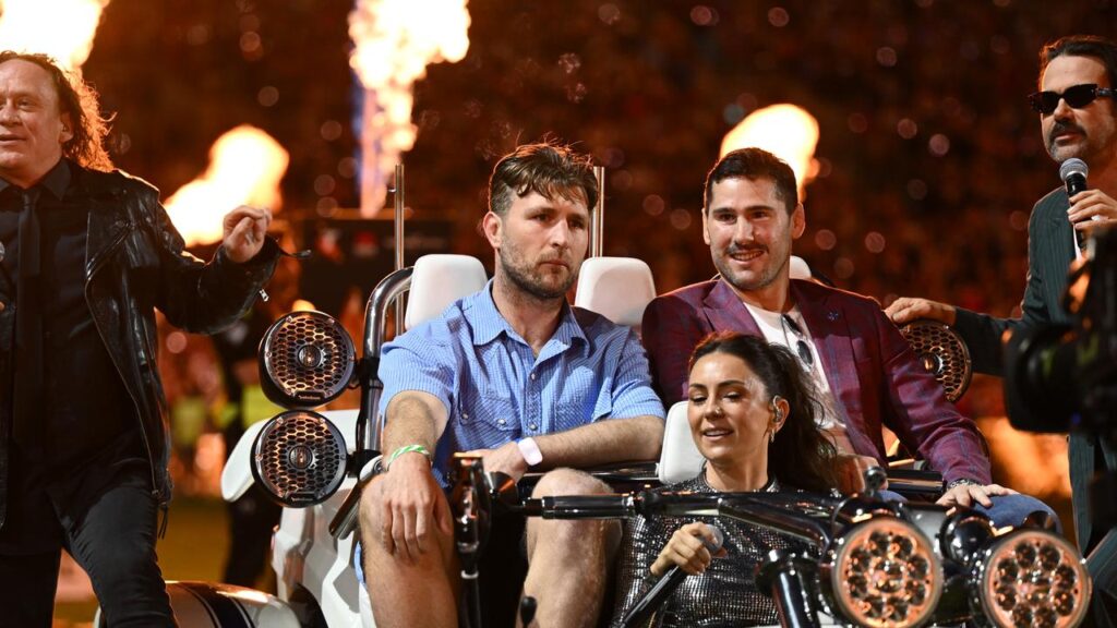 Jai Arrow (centre) is joined by Nathan Charles as well as Australian grand final performers.
