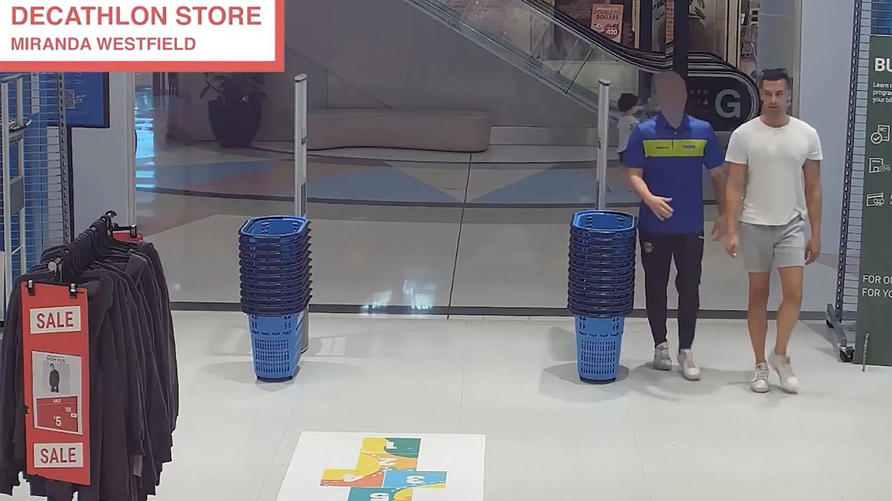two men in sports shop