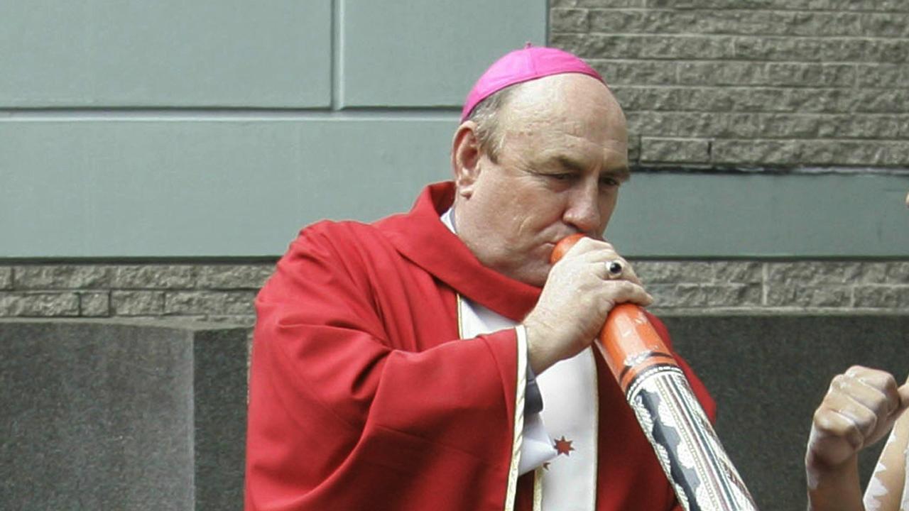 Saunders playing digeridoo