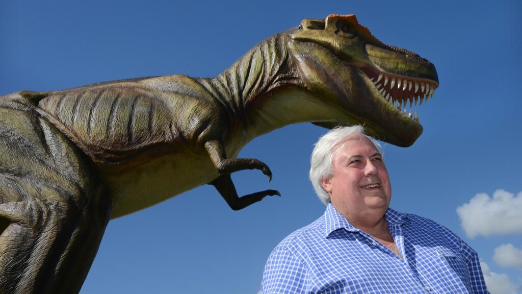 Jeff the dinosaur moved into the Coolum resort after the 2011 takeover led by Clive Palmer (right).
