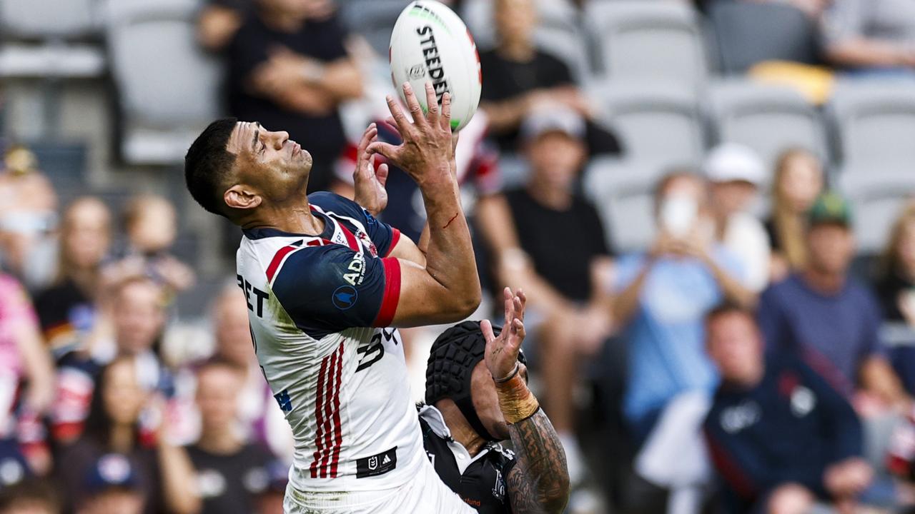 Daniel Tupou of the Roosters goes up for a high ball