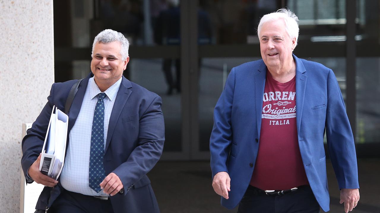 r Sam Iskander (left) and Clive Palmer (file image)