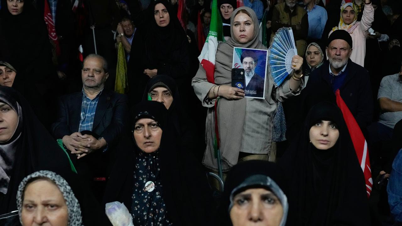 Demonstrators at a pro-government gathering at a square in Tehran.