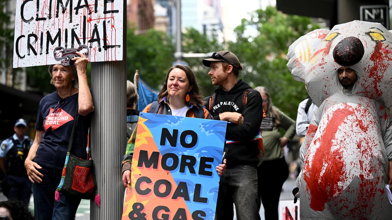 Protesters rally outside the Whitehaven Coal annual meeting in Sydney