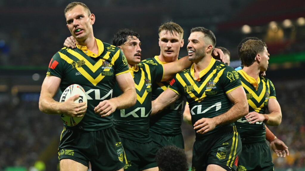 James Tedesco (second right) played a starring role as Australia withstood Fiji at the World Cup.
