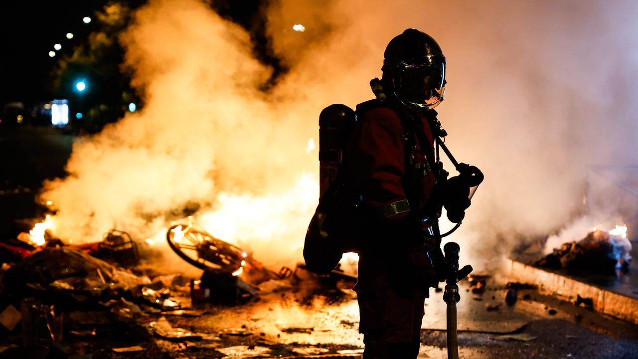 A French firefighter during protests in Paris, France