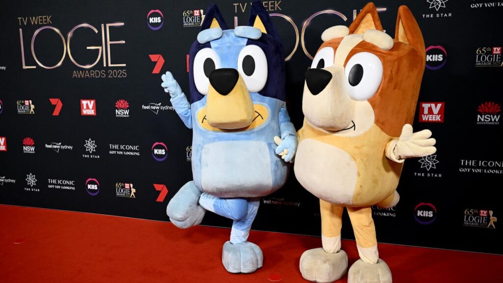 Cartoon depicting Bluey hit by a car driven by Daniel Andrews and Anthony Albanese draws ABC ire.
