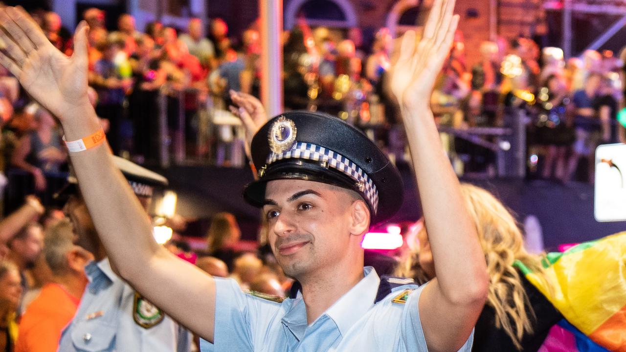 police officer with outstretched arms